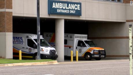 Ambulances await at a hospital in Montgomery, Alabama, as the state grapples with the latest coronavirus surge.