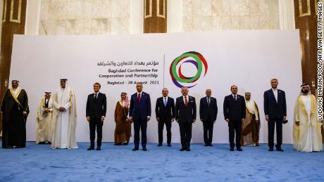 Breaching diplomatic protocol, the Iranian top diplomat stood in a row with country leaders during a group photo. His assigned placement was next to the Saudi top diplomat, alongside other foreign ministers. 