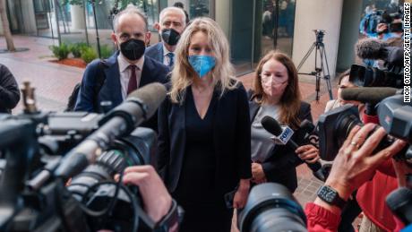Elizabeth Holmes, the founder and former CEO of blood testing and life sciences company Theranos, arrives for the first day of jury selection in her fraud trial, outside Federal Court in San Jose, California on August 31, 2021. 