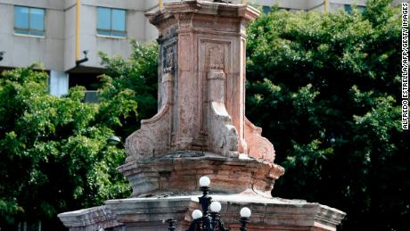 The pedestal where a statue of Christopher Columbus once stood is now empty in Mexico City. 