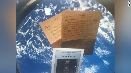 Personal items from the Keller family that went to space include one of Chad&#39;s letters as well as his memorial program.