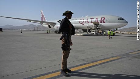 Flight lands in Qatar after Taliban cleared Americans and others to leave Afghanistan