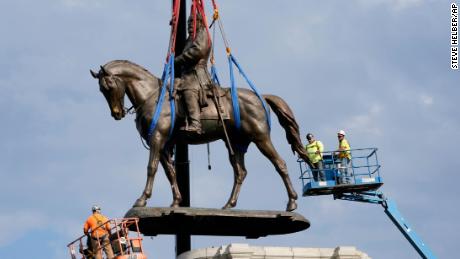 Crews remove the 12-ton statue of Confederate General Robert E. Lee on Monument Avenue in Richmond.