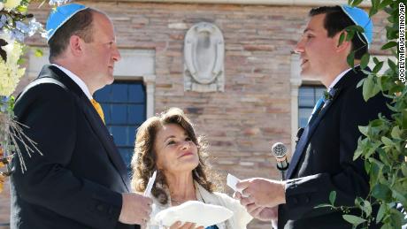 Colorado Gov. Jared Polis, left, and his partner, Marlon Reis, were married Wednesday in a Jewish ceremony, according to the governor&#39;s office. 