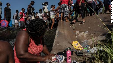 In pictures: Thousands of migrants in makeshift camp under Texas bridge