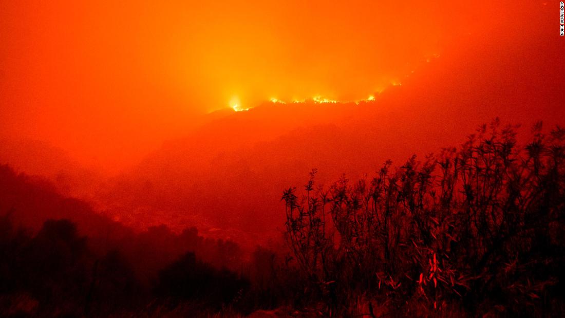 Flames from the KNP Complex Fire burn along a hillside in the Sequoia National Park on September 14. 