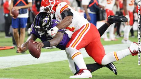 Jackson dives into the endzone past the tackle of Michael Danna of the Kansas City Chiefs.