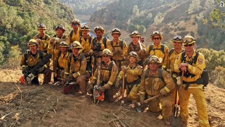 A firefighter crew during their deployment on the Chimney Fire in San Luis Obispo County, California, in 2016. California officials, faced with a shrinking pool of firefighters during major blazes, are increasingly turning to civilian environmental corps.