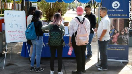 Students at Phoenix College gather to fill out voter registration forms on September 24, 2019, in Phoenix, Arizona. 