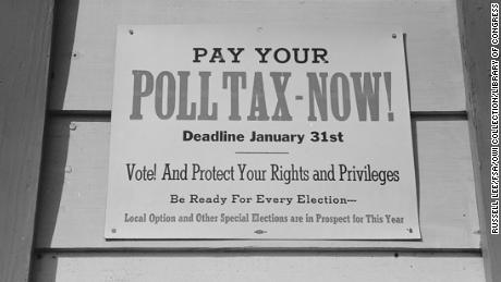 A poll tax sign in Mineola, Texas, 1939. Poll taxes were designed partly to keep lower-income people of color from voting.