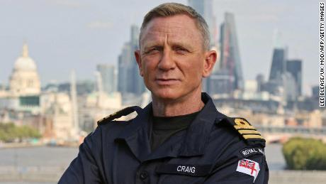 The British Royal Navy shows off its newest honorary officer, &quot;James Bond&quot; star Daniel Craig, at a ceremony in London this week.