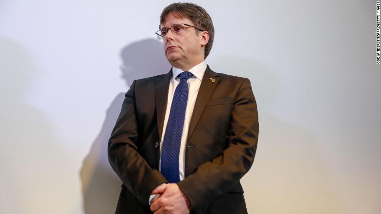 Catalan independence leader Carles Puigdemont arrested in Italy four years after fleeing Spain