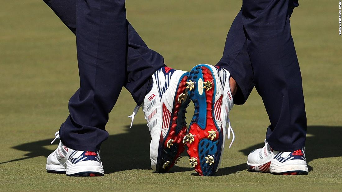 A view of the shoes worn by US pair Dustin Johnson and Collin Morikawa during Saturday morning&#39;s Foursome matches.