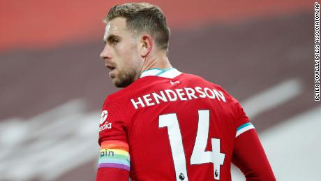 Liverpool&#39;s Jordan Henderson wears a rainbow coloured captain&#39;s armband in support of the Rainbow Laces campaign during a match