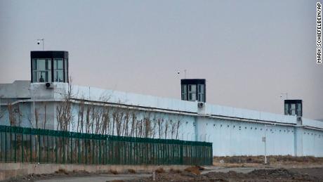 A guard patrols Number 3 Detention Center in Dabancheng in western China&#39;s Xinjiang Uyghur Autonomous Region.