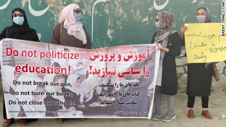 Women in Kabul return to work, school and the streets, in defiance of the Taliban