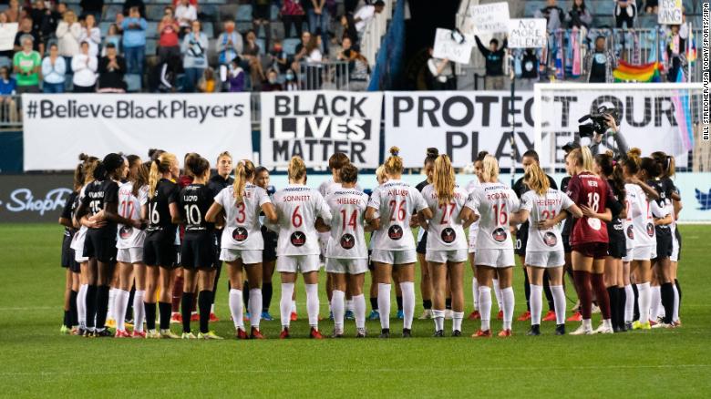 National Women's Soccer League players pause mid-match, stand in solidarity in first match back following postponement