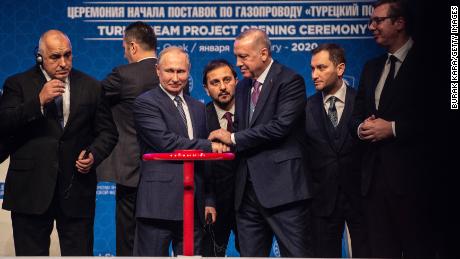 Russian President Vladimir Putin and Turkish President Recep Tayyip Erdogan shake hands at the opening ceremony of the Turkstream gas pipeline project in in Istanbul, Turkey, in January 2020.
