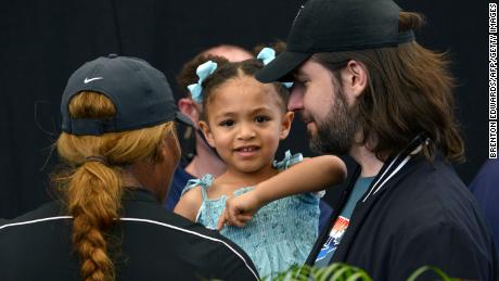 Serena Williams (L) and her husband Alexis Ohanian talk to their daughter Alexis Olympia Ohanian Jr during the &#39;A Day at the Drive&#39; exhibition tournament in Adelaide on January 29, 2021.