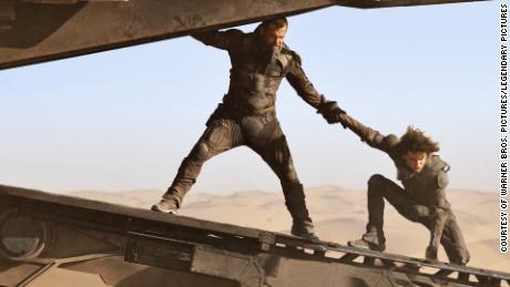 Josh Brolin (left) as Gurney Halleck and Timothée Chalamet as Paul Atreides in the 2021 adaptation of &quot;Dune.&quot;