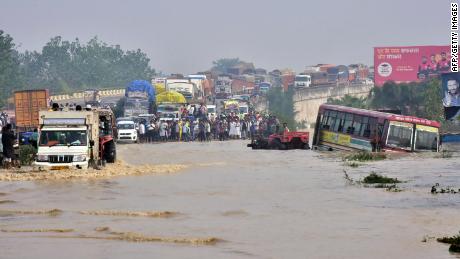 Heavy rains forced the river Kosi in India&#39;s Uttar Pradesh state to overflow.