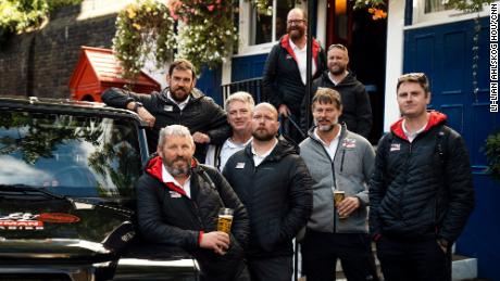 The team of military veterans share a pint of beer in London after finishing their epic trek.