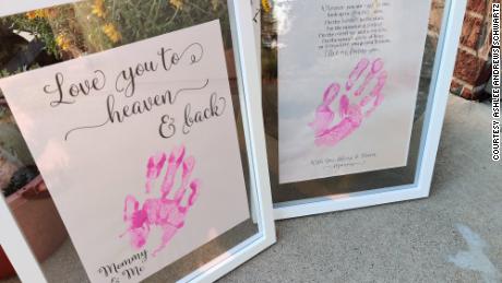 Emily&#39;s handprints on a photo Schwartz made to give Carmen once she is older.