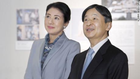 Japanese Emperor Nakuhito and Empress Masako visit an exhibition as they sit on their thrones at the Imperial Palace in Tokyo on February 10, 2020. 