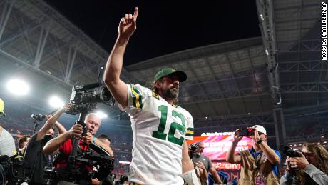 Rodgers celebrates after beating the Cardinals.