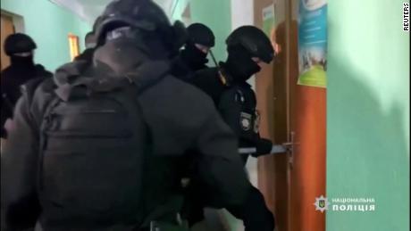 Video shows police raid for forged vaccine certificates 
