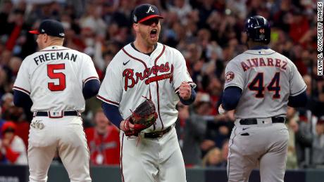 The Braves&#39; Will Smith celebrates the team&#39;s 3-2 win against the Astros in Game 4.