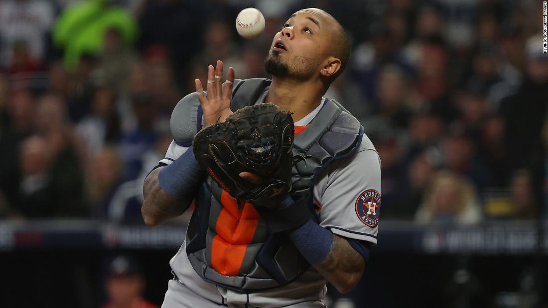 Martin Maldonado of the Astros catches a pop fly during the fourth inning of Game 5.