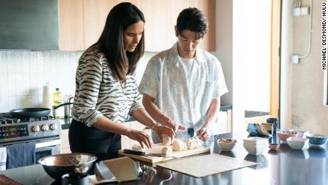 (From left) Padma Lakshmi and K-pop star Eric Nam dive into the flavors of LA&#39;s Koreatown in the holiday edition of &quot;Taste the Nation.&quot; 