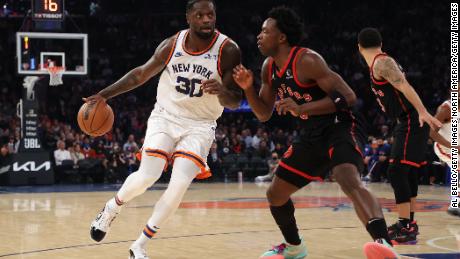 The Knicks&#39; Julius Randle drives against OG Anunoby.