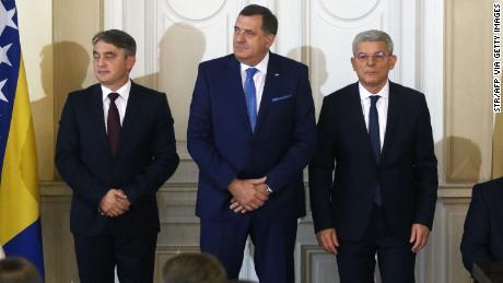 Newly elected members of the tripartite presidency -- Bosnian Croat member Zeljko Komsic (L), Bosnian Serb member Milorad Dodik (C) and Bosnian Muslim member Sefik Dzaferovic (R) -- attend their inauguration ceremony in Sarajevo in November 2018. 
