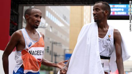 Nageeye and Abdi talk at the end of the men&#39;s Olympic marathon in Sapporo. 