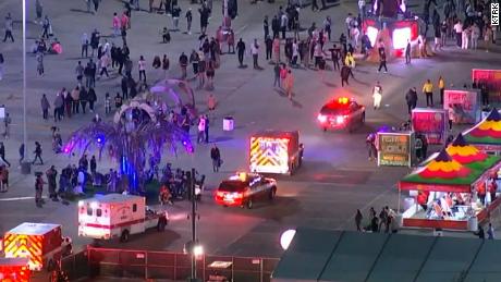 Ambulances arrive on the scene after a crowd surge at Astroworld Festival.