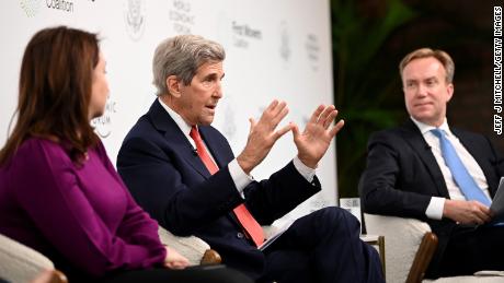 US Special Presidential Envoy on Climate John Kerry, center, speaks at the COP26 summit on Thursday.