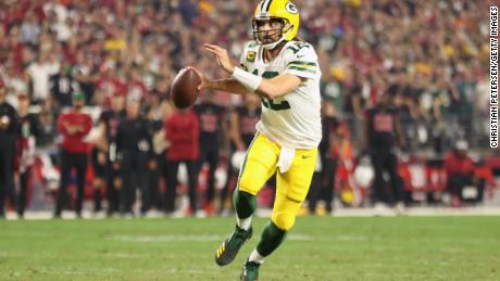 Rodgers looks to pass against the Arizona Cardinals at State Farm Stadium on October 28.