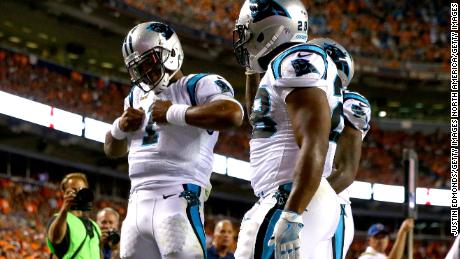 Newton celebrates after scoring on a two-yard rushing touchdown against the Denver Broncos on September 8, 2016.