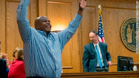 Dontae Sharpe enters a Pitt County courtroom to the cheers of his family after a judge determined he could be set free on a $  100,000 unsecured bond on August 22, 2019, in Greenville, North Carolina.