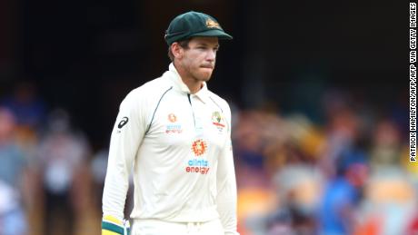 TOPSHOT - Australia&#39;s captain Tim Paine looks on between the overs on day five of the fourth cricket Test match between Australia and India at The Gabba in Brisbane on January 19, 2021. 