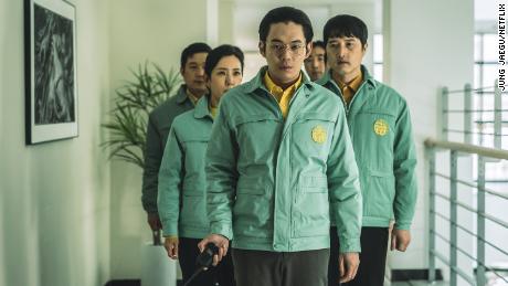 Ryu Kyung-Soo as Deacon Yuji (center) is shown in a scene from Korean thriller &quot;Hellbound.&quot;