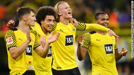 Witsel and Haaland (center) celebrate a goal against Hoffenheim in August.