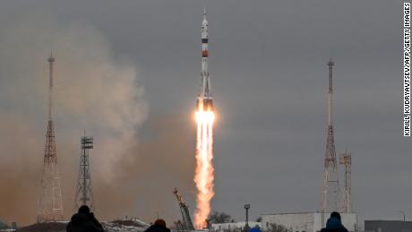 The Soyuz MS-20 spacecraft carrying the crew of Russian cosmonaut Alexander Misurkin, Japanese billionaire Yusaku Maezawa and his production assistant Yozo Hirano blasts off to the International Space Station (ISS) from the Moscow-leased Baikonur cosmodrome in Kazakhstan on December 8, 2021. (Photo by Kirill KUDRYAVTSEV / AFP) (Photo by KIRILL KUDRYAVTSEV/AFP via Getty Images)