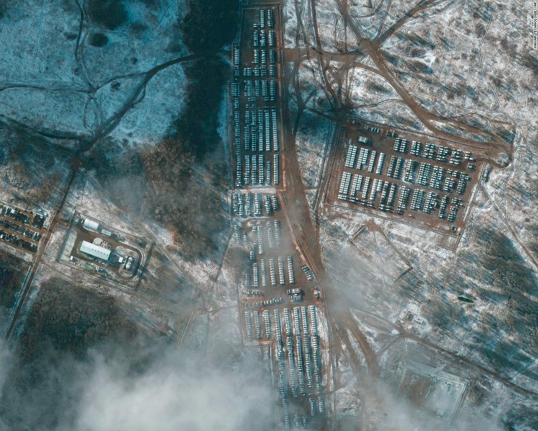 This satellite image shows Russian troops in Yelna, Russia, on November 9. &lt;a href=&quot;https://www.cnn.com/2021/11/04/europe/russia-ukraine-military-buildup-intl-cmd/index.html&quot; target=&quot;_blank&quot;&gt;Satellite photos&lt;/a&gt; taken that month revealed Russian hardware -- including self-propelled guns, battle tanks and infantry fighting vehicles -- on the move at a training ground roughly 186 miles (300 km) from the border.
