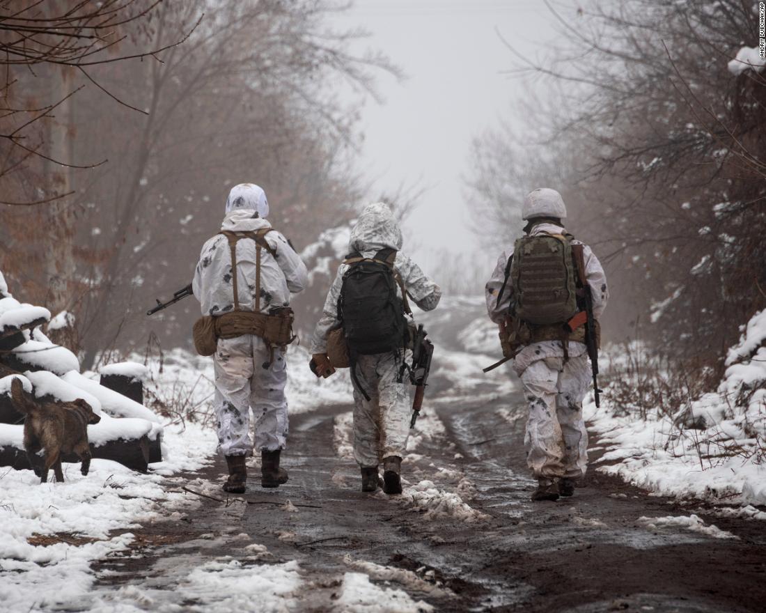 Ukrainian soldiers walk near Katerinivka on December 7.