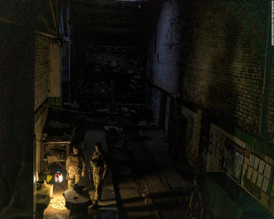 Ukrainian soldiers are seen at a base built into the skeletal remains of a tire factory in Avdiivka on December 1.