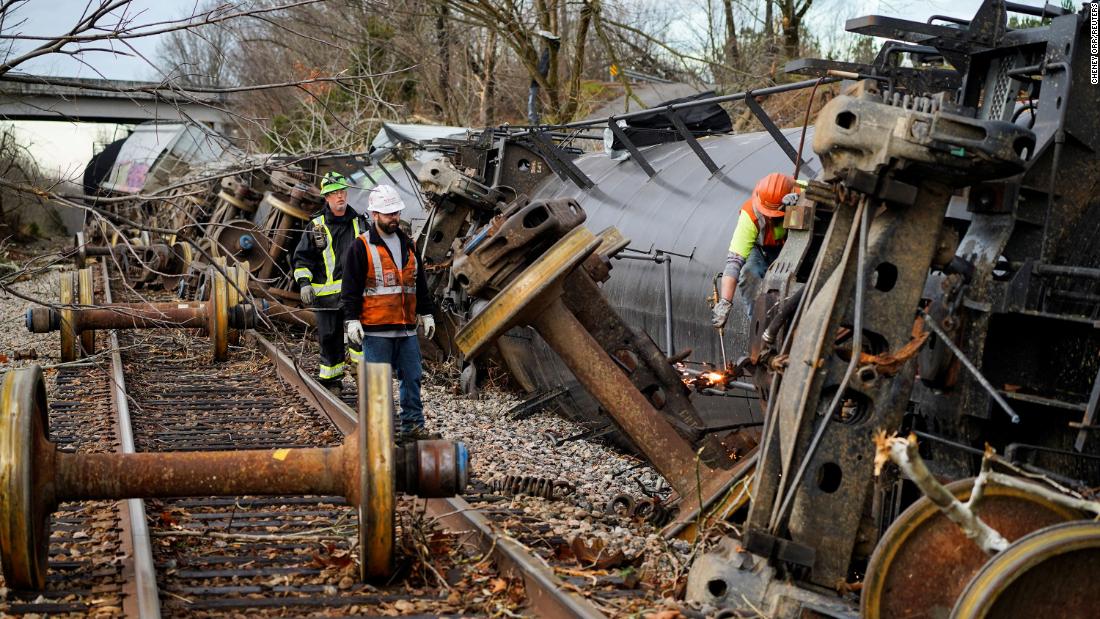 People work at the scene of a train derailment in Earlington, Kentucky.