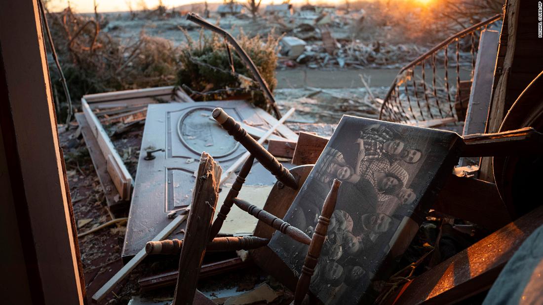 A family photo lies among the debris inside a house on December 12 after a tornado in Dawson Springs, Kentucky.